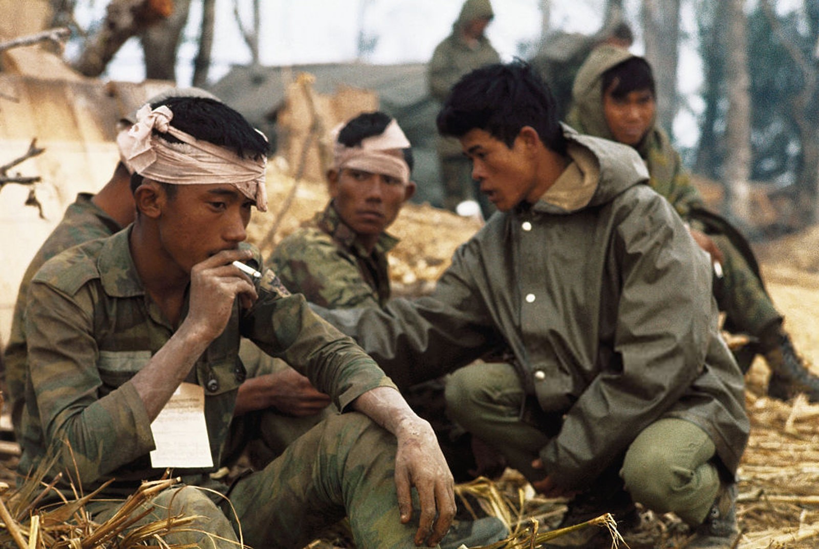 Vietnam War 1971 - Wounded Vietnamese Rangers await medivac chopper