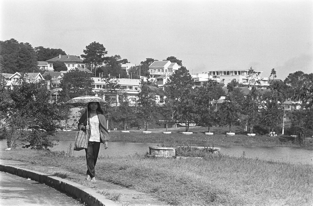 DALAT 1967 - Woman strolling around the lake.