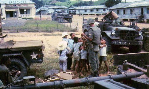 Medic Passing Out Candy at Khanh Duong