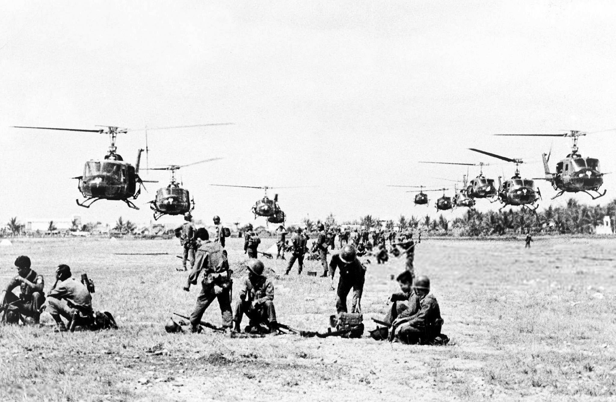 U.S. helicopters arriving to air lift Vietnamese government Rangers of the 43rd battalion into battle against NLF (Viet Cong) guerrillas, Saigon, 1965.