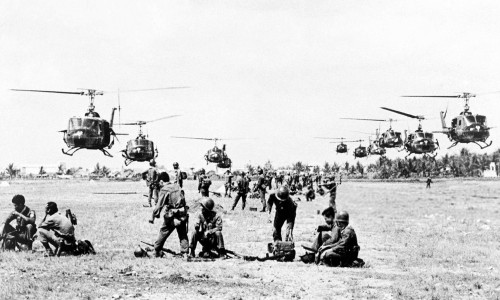 U.S. helicopters arriving to air lift Vietnamese government Rangers of the 43rd battalion into battle against NLF (Viet Cong) guerrillas, Saigon, 1965.