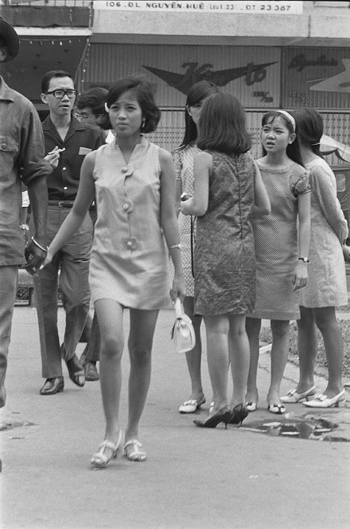 The miniskirted scene in Saigon. Young Vietnamese girls wear Western dress. Jan 1966 - Photo by François Sully
