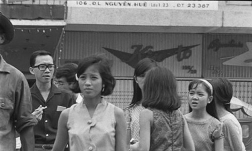 The miniskirted scene in Saigon. Young Vietnamese girls wear Western dress. Jan 1966 - Photo by François Sully