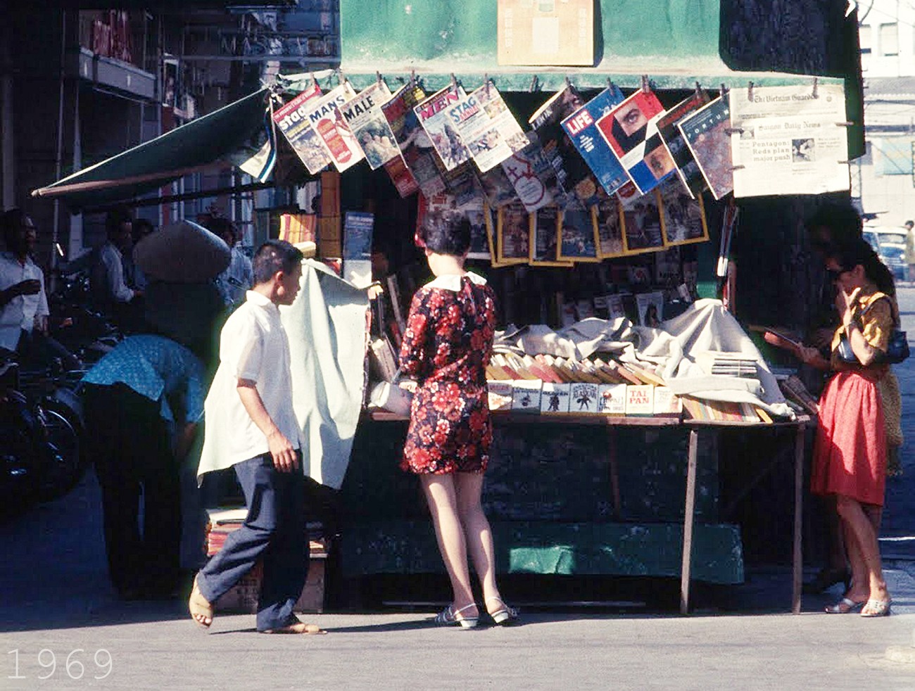 Saigon April 1969 - Newstand on Tu Do st. Photo by Brian Wickham