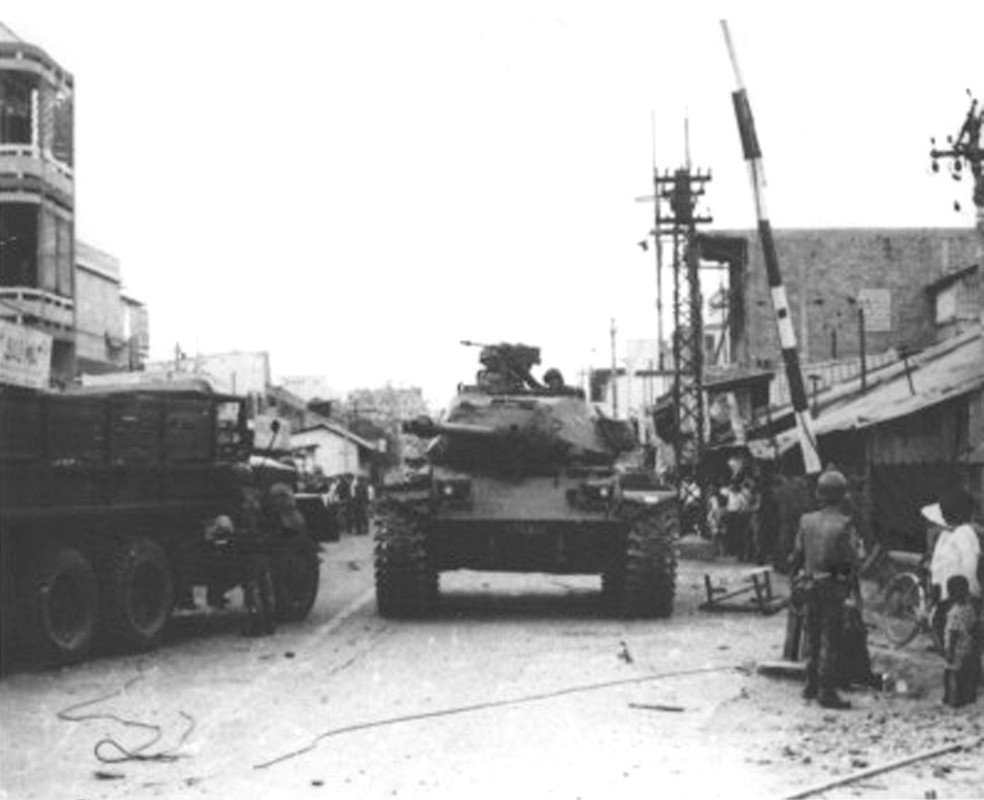 Vietnamese armor moves into the rail crossing area of Phu Nhuan section near Tan Son Nhut