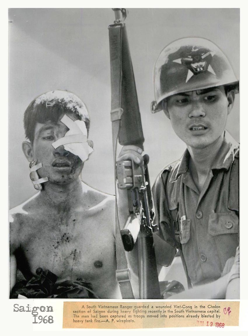 Saigon 1968 - Vietnamese Ranger with Wounded Viet Cong Prisoner in Saigon - Press Photo