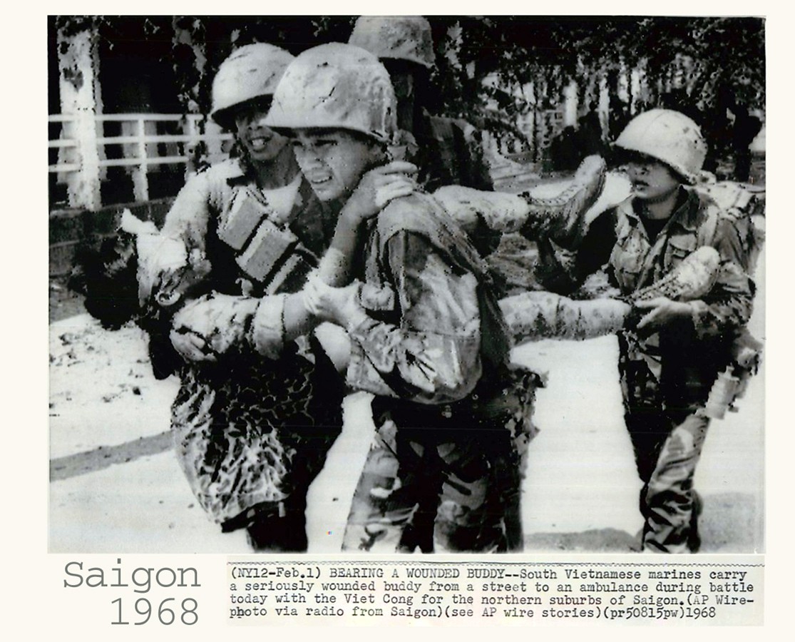 Saigon 1.Feb.1968 - Vietnamese Marines Carry Wounded Buddy from Battle