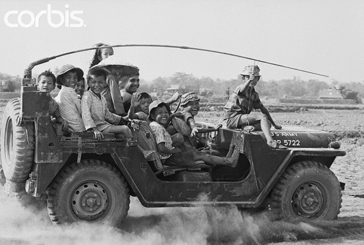 13 Mar 1968, Cu Chi, South Vietnam - Hitching a Ride.