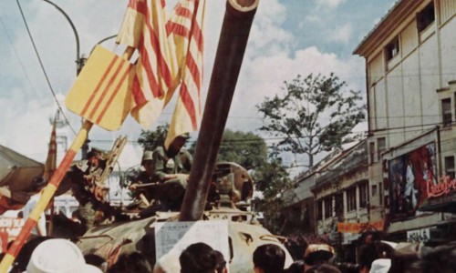 Saigon 1972 - People inspect a captured T-54 tank on display in Lam Son Square