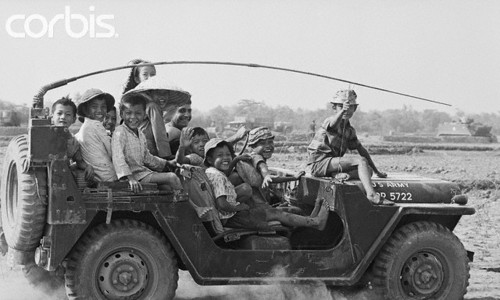 13 Mar 1968, Cu Chi, South Vietnam - Hitching a Ride.